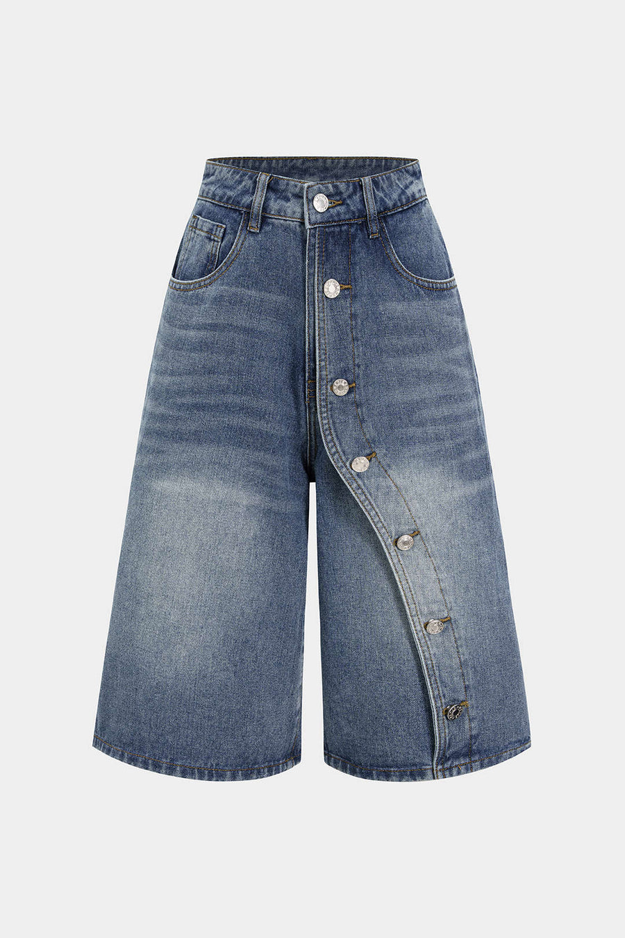 Asymmetriset napilliset denimshortsit