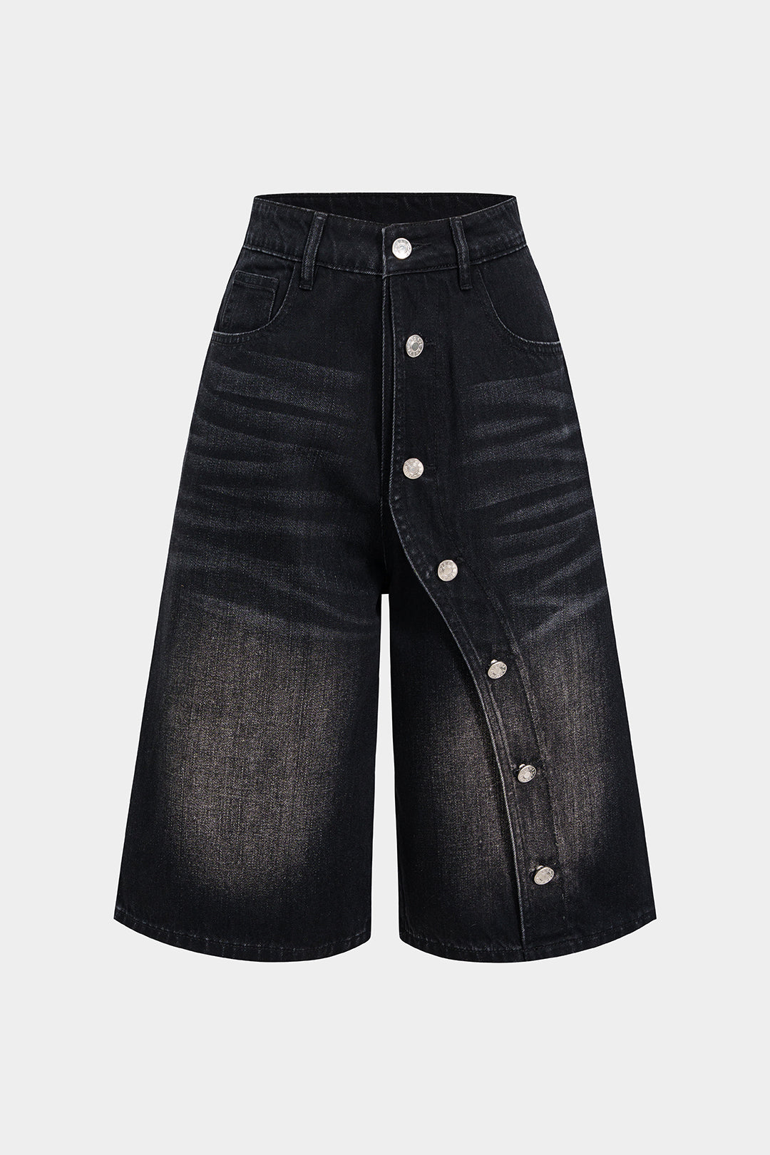 Asymmetriset napilliset denimshortsit