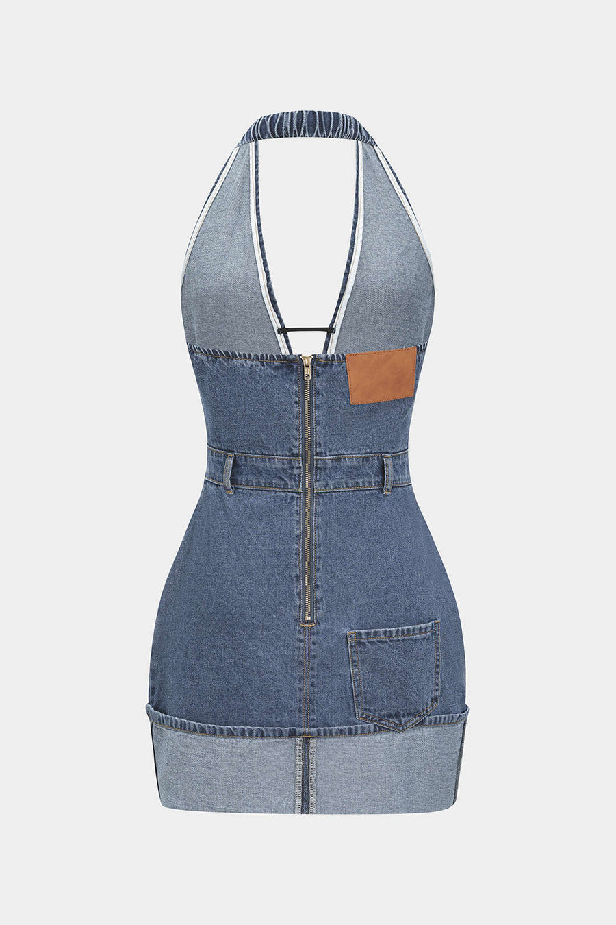 Denim-materiaalinen, selkäaukkoinen, pesunkäsitelty, vetoketjullinen halter-mallinen minihame