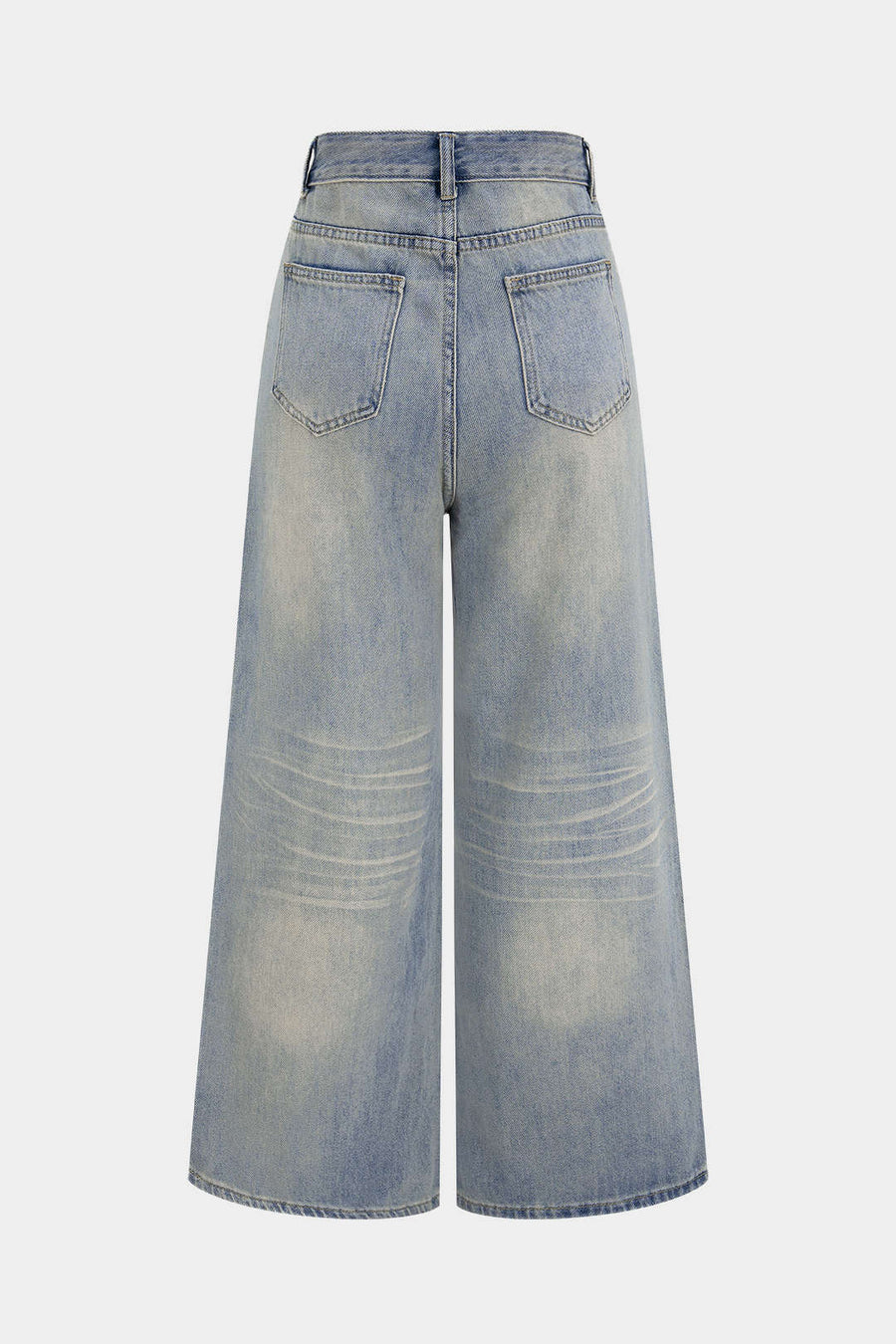 Asymmetriset, kuluneet, leveälahkeiset denimfarkut