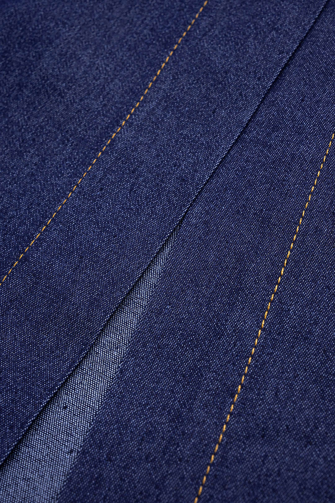 Denim-kangas, epäsymmetrinen, rypytetty bustier-malli, vyöllä varustettu, vetoketjullinen maksipuku
