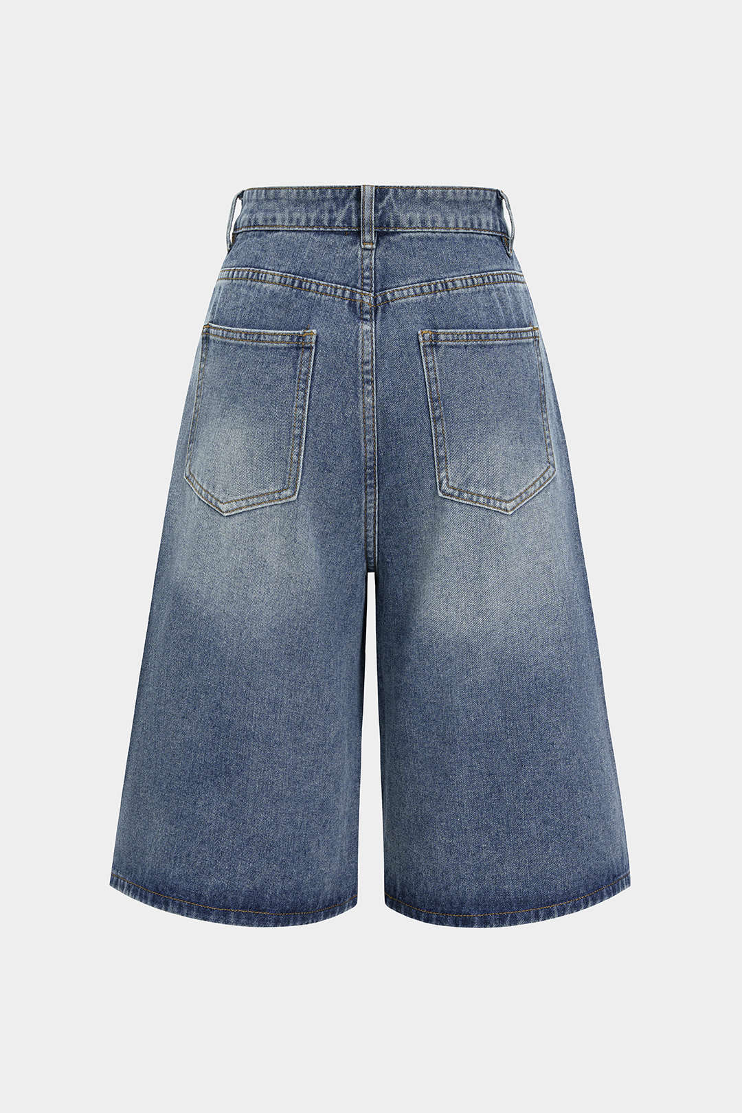 Asymmetriset napilliset denimshortsit