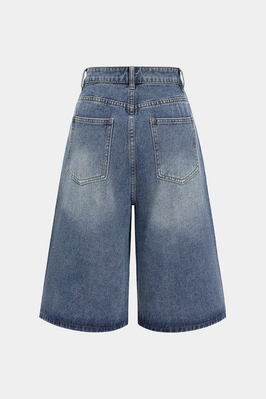 Asymmetriset napilliset denimshortsit